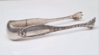 Image 2 of Pince à sucre ou à glaçon en argent massif decor patte de lion