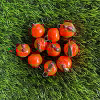 Image 1 of orange charm