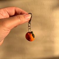 Image 2 of orange charm