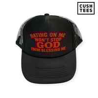 Hating on me won't stop God from blessing me (Trucker Hat)