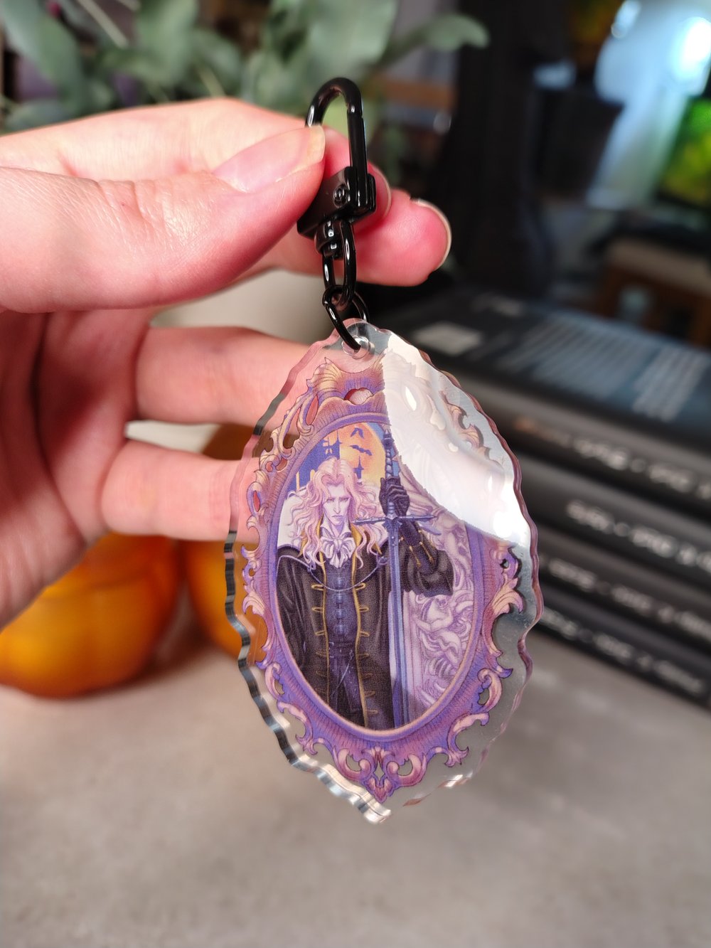 Image of Alucard in frame clear acrylic charm