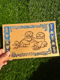 otter embrace block print