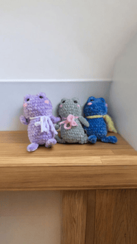 Image 1 of Dangling Frogs