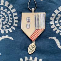 Image 1 of upside down house pendant