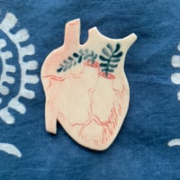 Image 1 of growing heart brooch