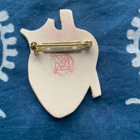Image 2 of growing heart brooch