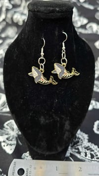 little enamel skeleton whale dangle
