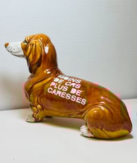 Image 1 of Joli chien en céramique avec un slogan