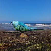 Whittle a little Song Bird 