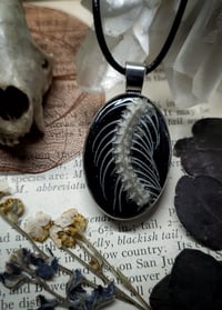 Image 1 of Double Sided Snake Ribcage and Floral Pendant