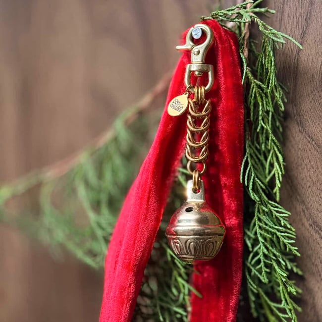 Brass sleigh bell charm