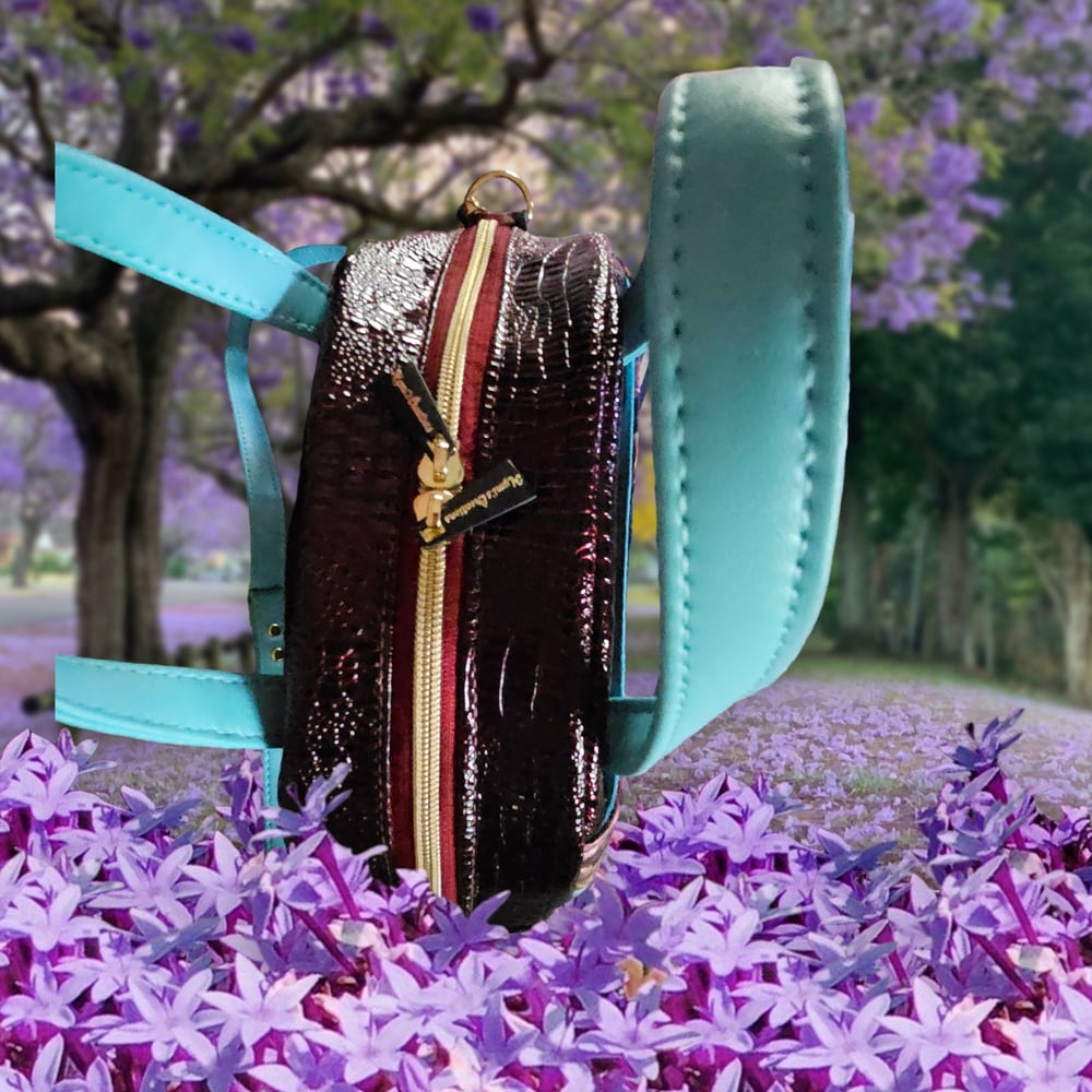 Image of Handmade Floral Round Crossbody Bag: Wine Croc Print Vinyl