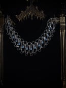 Image 1 of hand in hand choker