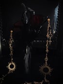 Image 2 of eclipse glasses chain