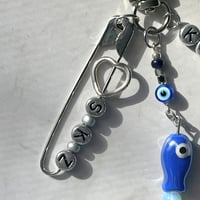 Image 2 of SKZ KARMA Keychain | Blue Evil Eye & Fish Charm Keychain