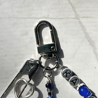 Image 5 of SKZ KARMA Keychain | Blue Evil Eye & Fish Charm Keychain