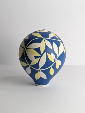 Image of Medium Blue, Yellow & White Leaf Vessel 