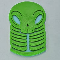 Image 1 of  3in skelly token - green/ blue