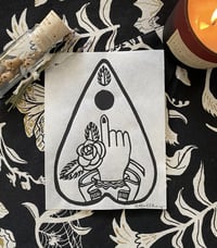 Hand and Rose Planchette