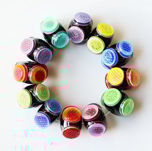 Rainbow Flames Fly-Eye Rondells - 12 quite colorful beads