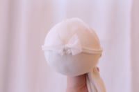 Image 1 of Snow bow tieback 