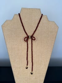Image 1 of Garnet with Heart Charms Bow Necklace