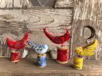 Image 5 of Small yellow bird on spool