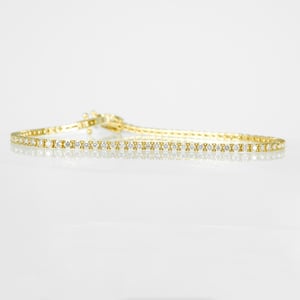 Image of 9ct yellow gold tennis bracelet set with lab grown diamonds = 2ct E-F VS total weight. TB8, TP11