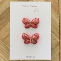 Golden butterfly clip