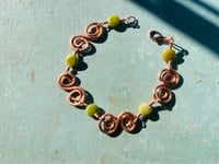 Image 4 of copper spiral bracelet with green turquoise