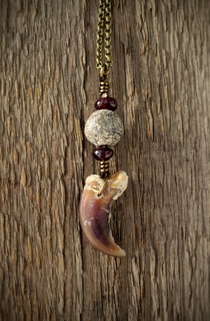 Image of Wolf Claw Necklace with Garnet and Fossil Beads