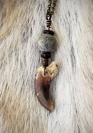 Image of Wolf Claw Necklace with Garnet and Fossil Beads