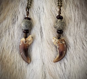 Image of Wolf Claw Necklace with Garnet and Fossil Beads