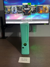 Image 1 of Xbox 360 Slim 500Gb Custom Green Seafoam BADAVATAR W/ Custom Fan 