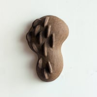 Petite sculpture murale marron