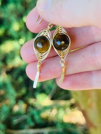Image 1 of tigers eye herringbone wrapped earrings in gold