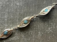 Image 4 of wire wrapped gold and emerald bracelet