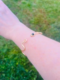 Image 4 of gold hammered bangle with jade