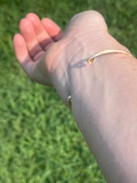 Image 4 of gold hammered cuff with green turquoise