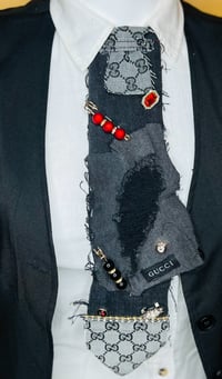 Image 1 of Handmade Gucci Women’s Patchy Necktie – Black & Light Gray, Rugged Edges