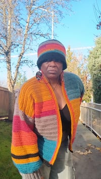 Image 9 of Oversized Crochet Cardigan – Ankh & Eye of Horus Tapestry | Caron Big Cakes “Toffee Brickle”
