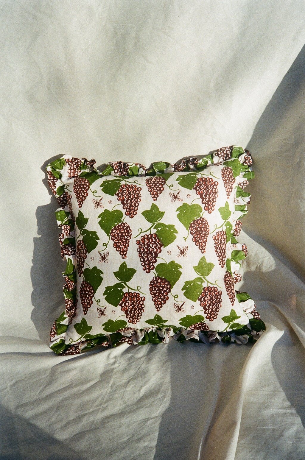 Image of Grapevines and Dragonflies ruffle cushion