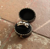 Image 1 of Cluster wave ring with diamond 