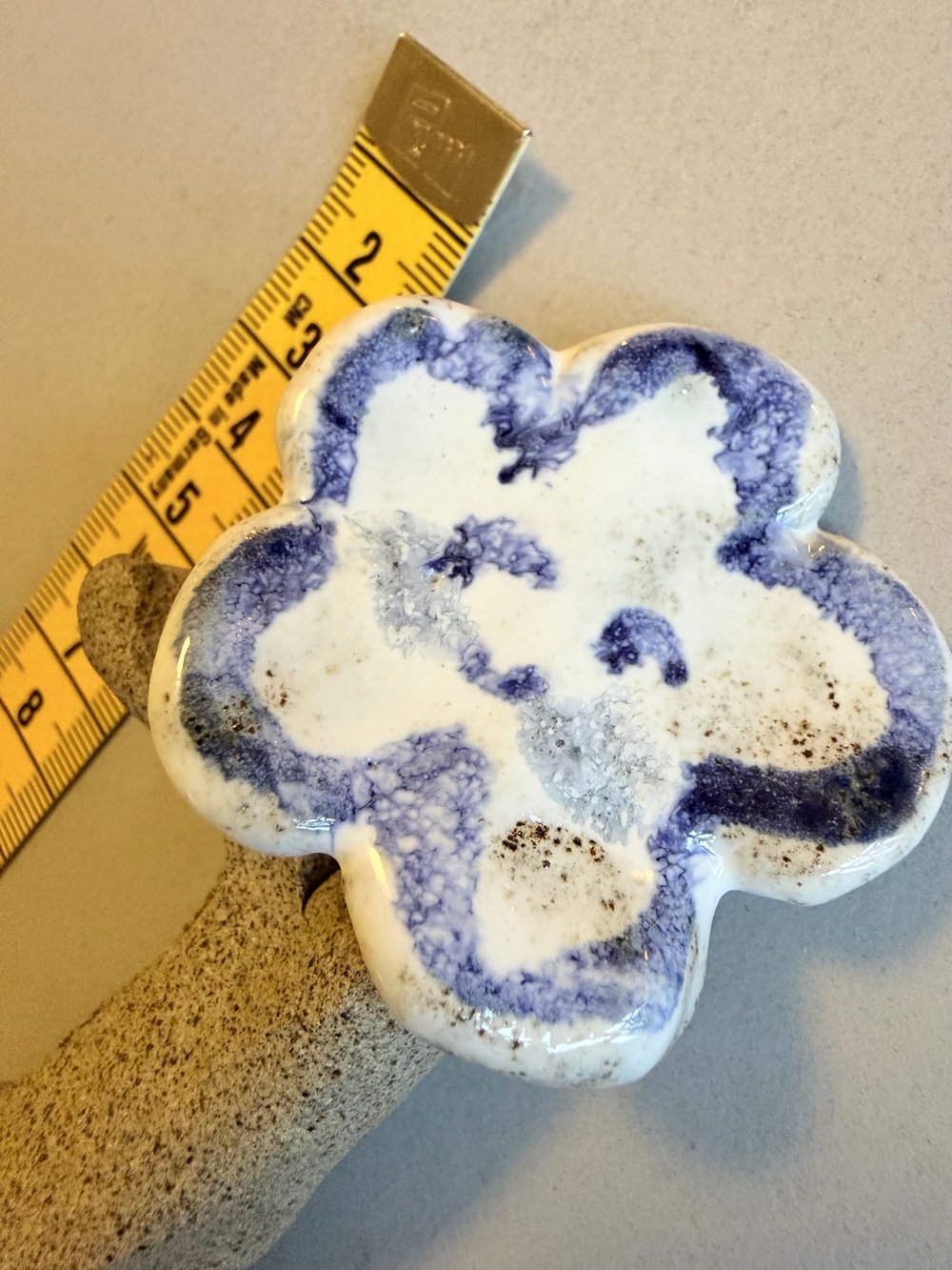 11 lille figur i stentøj 