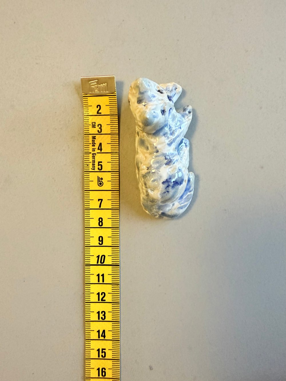 16 lille figur i stentøj 