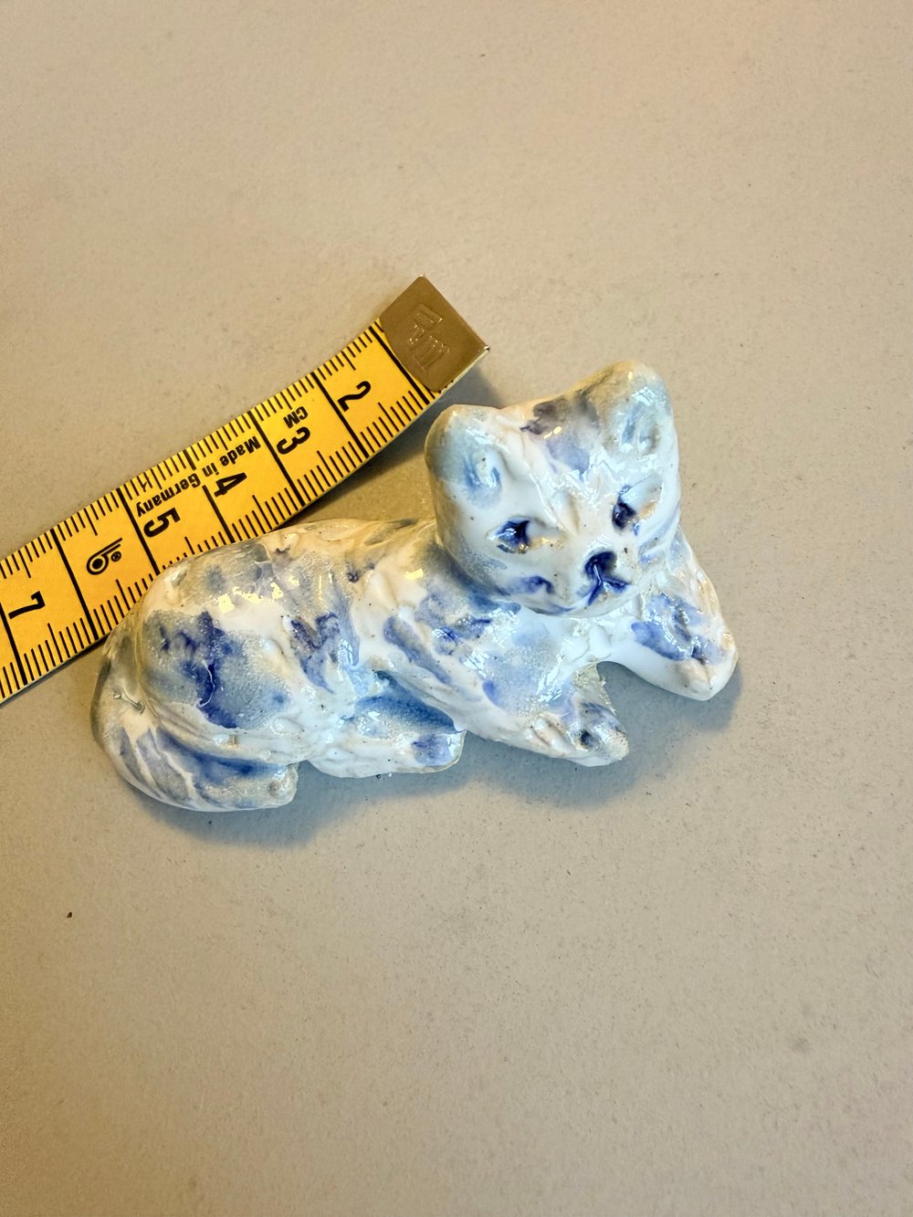 16 lille figur i stentøj 