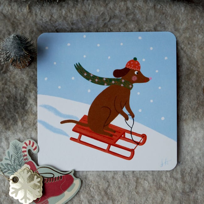 Collection de Noël 2025 : chien sur luge