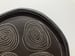 Image of four circles black stoneware platter