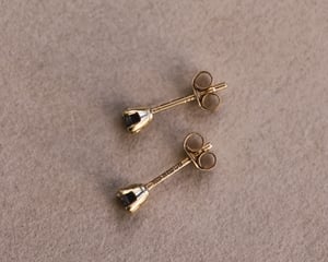 Image of 9ct gold, dark grey diamond, stud earrings
