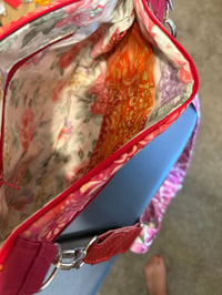 Image 5 of Red Cross body with adjustable stry